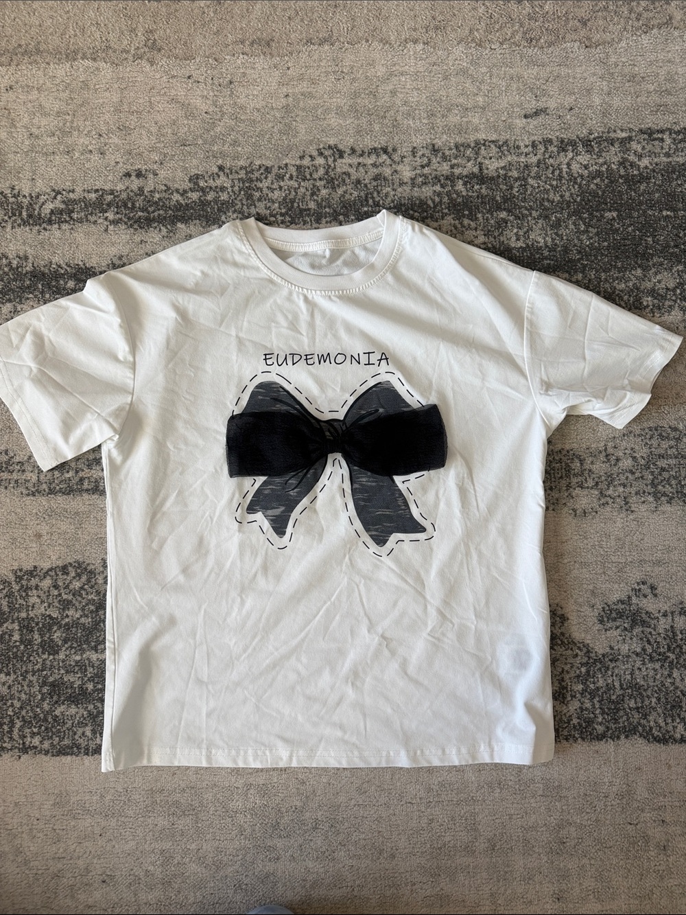 Demonia White Tee with Black Bow Graphic
